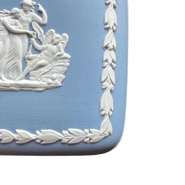 A refined Wedgwood blue jasperware lidded box, featuring the iconic matte periwinkle-blue ground with crisp applied white...