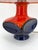 A table lamp * Fat Lava ceramic * Made in Germany in the 1960s * Fiery red and blue ceramic * Includes original orange...
