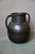 with its rich patina and striking luster, this large water jar is a truly captivating piece. Made of copper and metal, it...