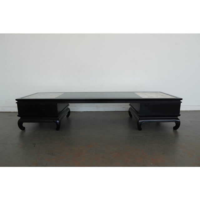 This vintage Lane coffee table reflects a refined Asian-inspired design, distinguished by its dramatically low profile.....
