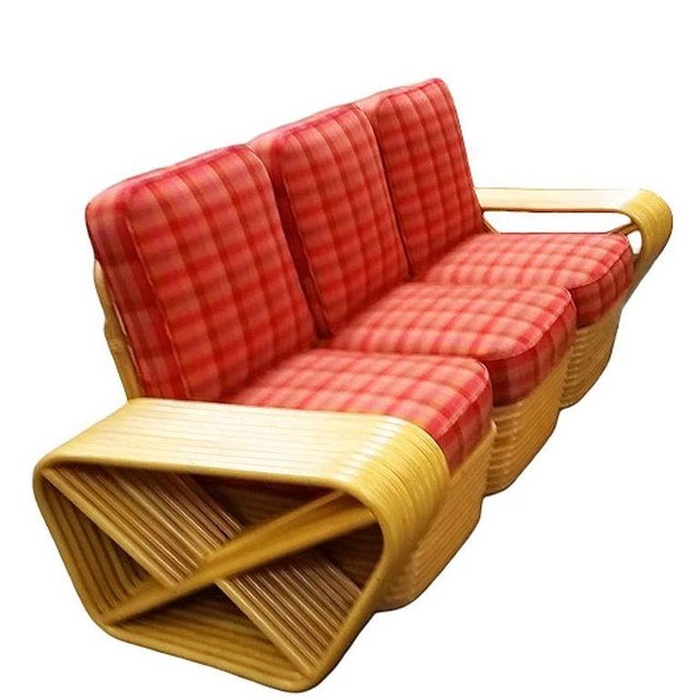 This beautifully restored Mid Century ten-strand square pretzel arm rattan 3-seater sectional sofa with custom-made...