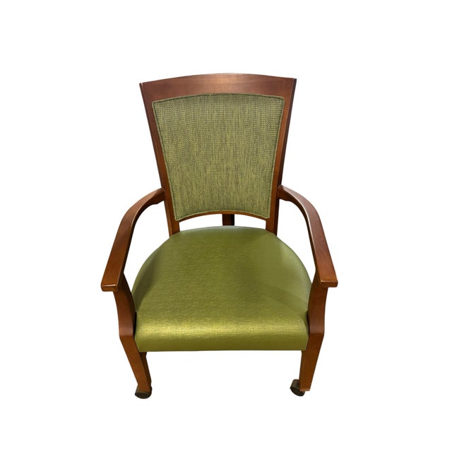 Sophisticated contemporary executive armchair featuring a warm cherry-finished hardwood frame with gently curved arms and...
