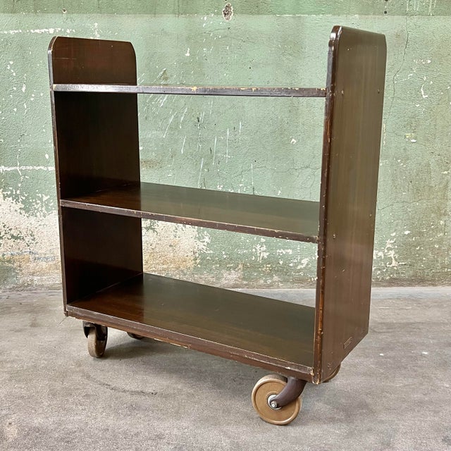 Vintage 1940s-1950s-era Gaylord Brothers Inc. solid wood rolling library book cart. It is in its original condition, but...