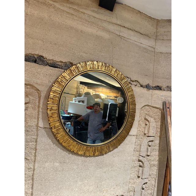 For your consideration, a French brutalist golden round mirror. Unmarked. Dimensions: 30.25" diameter, 1" D, Mirror only...