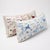 An extra-long lumbar pillow cover set made from hand-embroidered Uzbek Suzani cotton — hand embroidered horses and sun on...