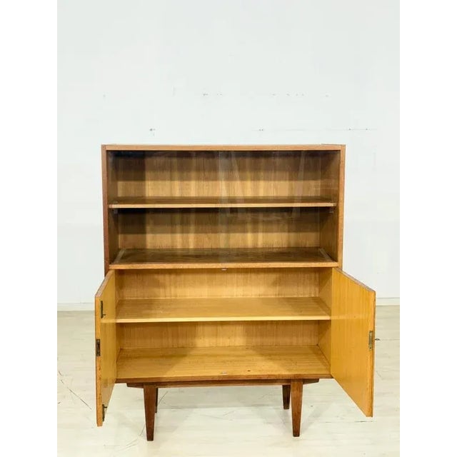 For sale is a beautiful Hellerau display cabinet or cabinet from the 1960s in good condition. • German Design • Original...