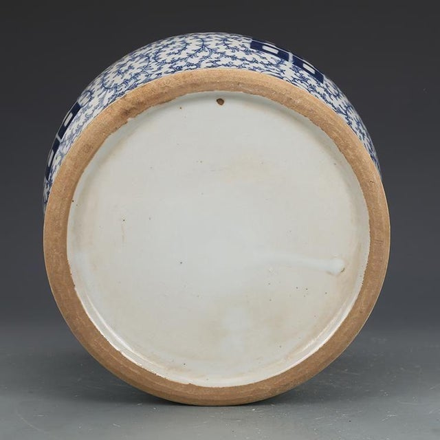 Beautiful Chinese blue‑and‑white lidded general jar, decorated with classic double‑happiness (囍) characters amid scrolling...