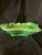 This vintage decorative glass bowl features a distinctive organic, wave-like ruffled edge reminiscent of Art Deco-era...