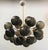 Italian oval shaped sputnik chandelier with 24 frosted smoky Murano glass globes mounted on brass frame in unlacquered...