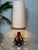 Large vintage fat lava floor lamp with neutral colors. 2 light points (E27). Both the ceramic and the fabric shade are...