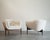 A striking pair of 1950s lounge chairs, fully restored by Stamford Modern to highlight their sculptural elegance and...