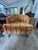 Pair of mid-century modern barrel back club chairs in the style of Harvey Probber, upholstered in colorful striped velvet...