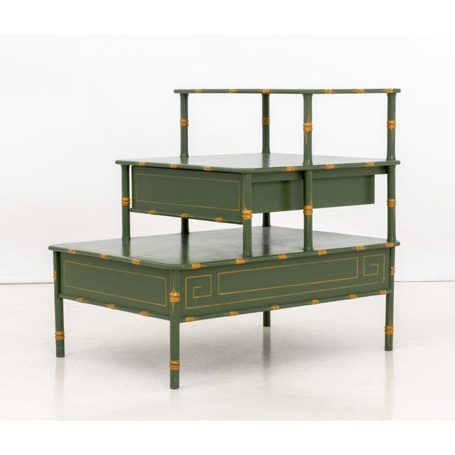 Green Lacquered and Yellow Painted Three-Tier Bedside Table, with two drawers. 26" H x 21.25" W x 28" D. Provenance: From...