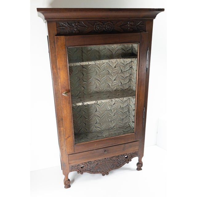 We are selling this nice probably French Country or Provincial carved wood display case vitrine or spice cabinet. The...