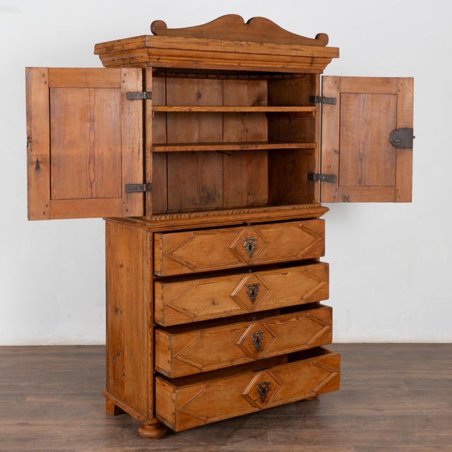 Beautifully crafted Swedish pine cabinet standing just over 6' tall with decorative top (which is removable). Two cabinet...