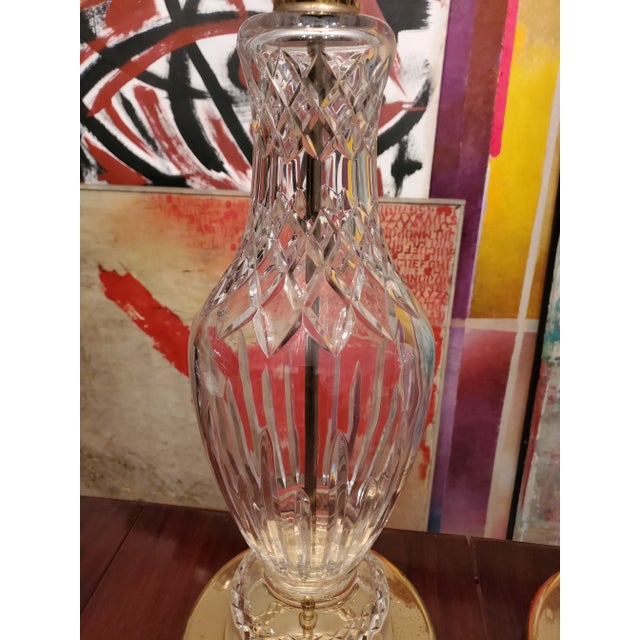 A large pair of very fine brilliant crystal Baccarat style lamps ( note Baccarat used paper labels after the mid century...