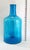 Offering a vintage Blenko Glass turquoise blue decanter vase # 6955L, designed by Joel Myers. This item is signed with the...