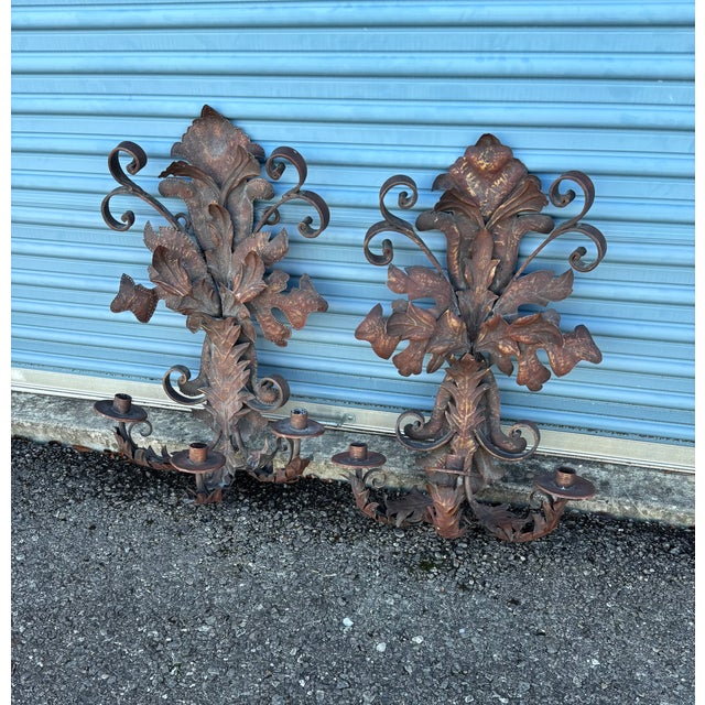 Large French Inspired Non Electrified Wall Sconces . Triple Arm Candle Holder constructed of Iron and Metal. Comes in a...