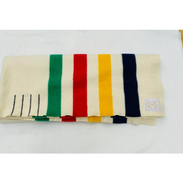 For your consideration… 1950s Hudson Bay Point blanket in a creamy white wool with bold stripes. Features the classic 4...