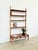 Wall system attributed to william watting, manufactured by scanflex, denmark, 1960s. Teak and beech in a subtle...