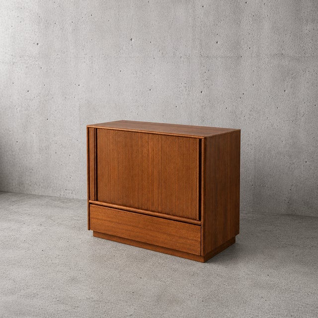 Mid-Century Modern Danish Teak Tambour Door Cabinet, 1960s, in Very Good conditions. Designed 1970 to 1979