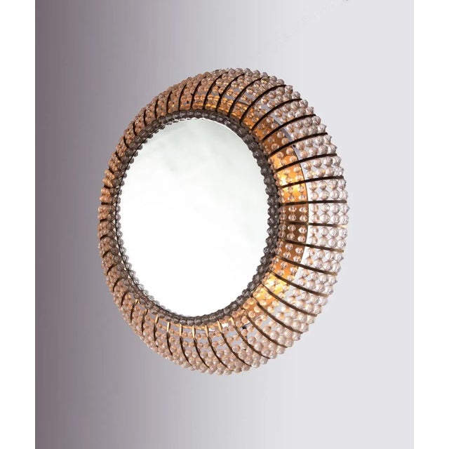 Elegant illuminated mirror with pearls on a brass frame. Designed in the style of Emil Stejnar for Rupert Nikoll, Vienna,...