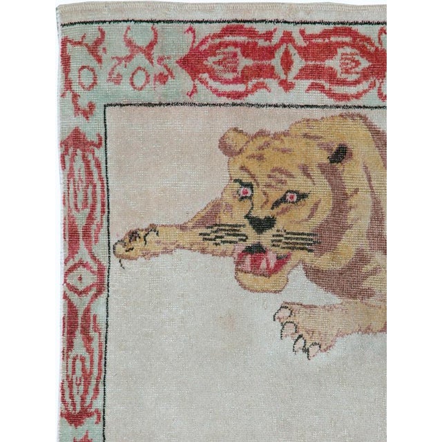 A vintage Turkish Anatolian pictorial rug from the mid-20th century. Measures: 3' 0" x 3' 7"