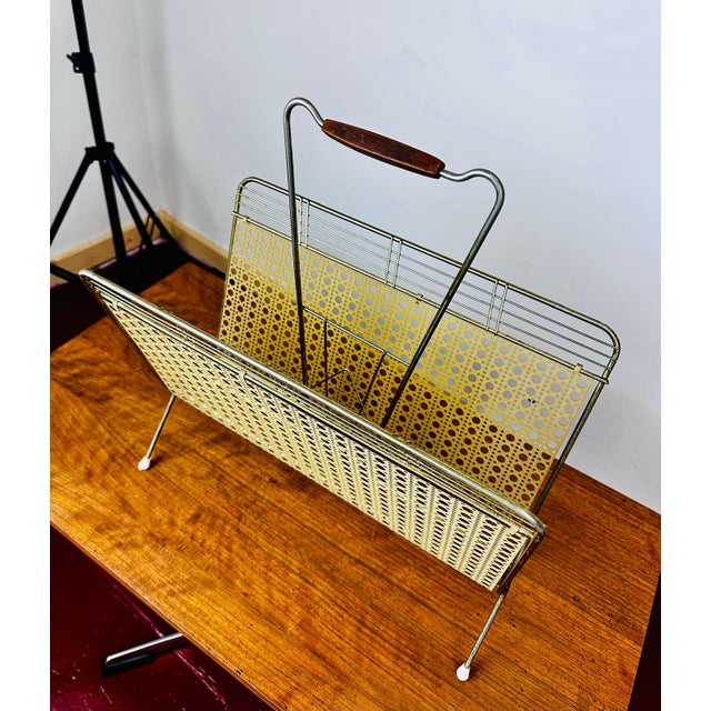 Freestanding magazine rack manufactured during the late 1950s to early 1960s in Central Europe, probably Germany or...