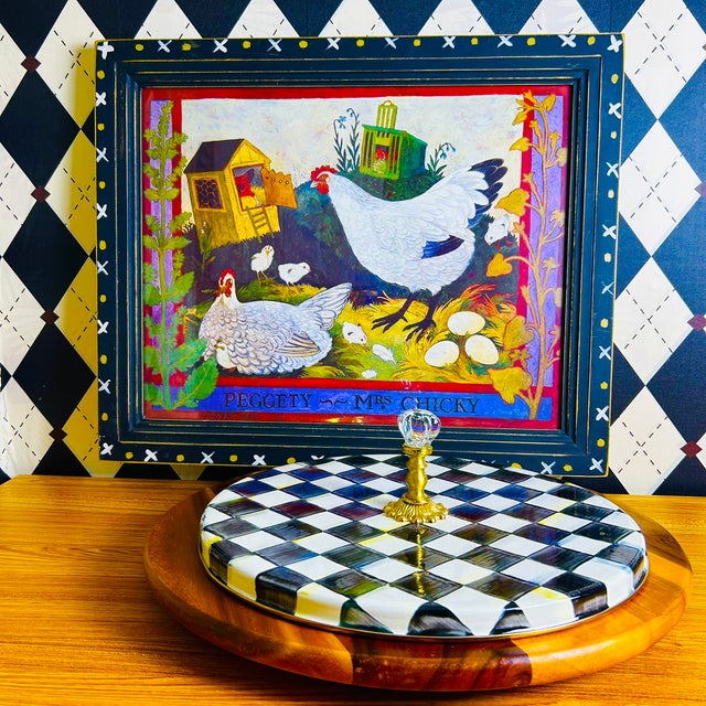 Large framed print of “Peggety and Mrs Chicky” by British artist Anna Pugh, featuring a richly detailed rural scene with...