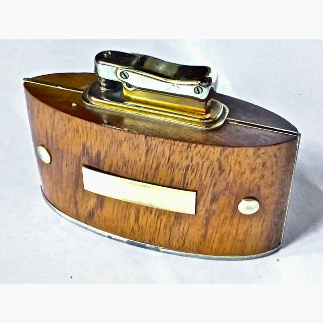Vintage Mid-Century Modern wood and brass cigarette lighter. With brass plaque on the front. Brass igniter and walnut...