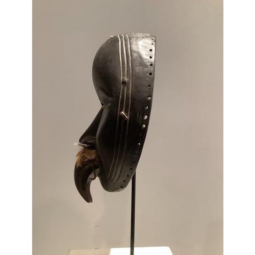 Ivory Coast Dan mask, early 20th century Hardwood, fibers Patina of use Dimensions: 26 x 14 cm This piece is attributed to...