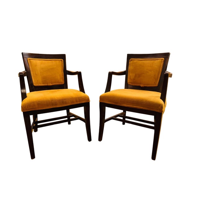 Gorgeous mid-century mustard upholstered arm chairs in wonderful condition. Sturdy and comfortable, these chairs will add...