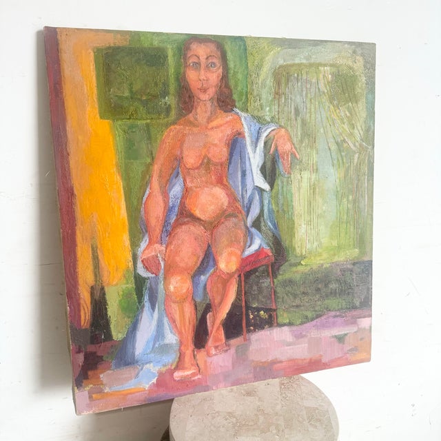 This vintage original oil painting of a nude woman sitting is a striking portrayal of form and color. The bold...