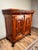 This handsome English Jacobean Revival buffet dates to the early 20th century and reflects the enduring popularity of the...
