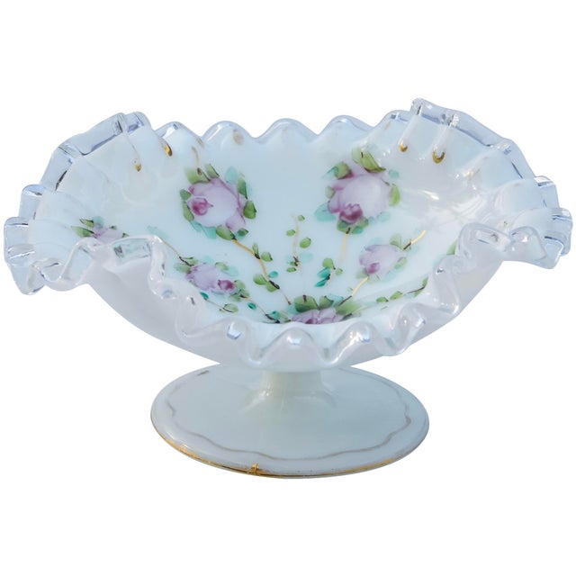 Eye-catching midcentury heavy glass centerpiece, exquisitely hand-crafted in a playful sleek silhouette with ornate...