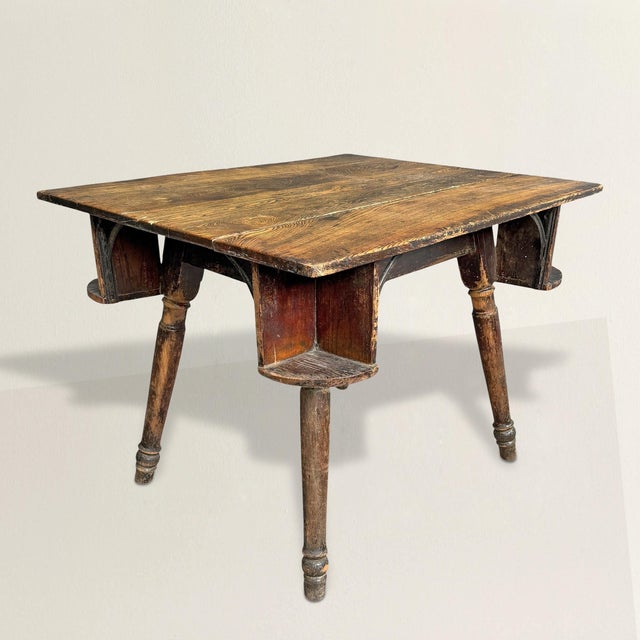 This table has heard more secrets than a confessional. A 19th century American elmwood poker table, likely pulled from the...