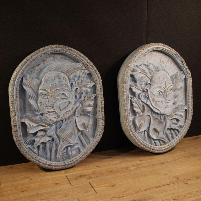 Oriental bas-relief sculpture from the second half of the 20th century. Carved, chiseled, gilded, and painted wood...