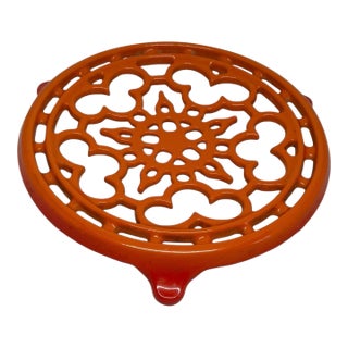 Vintage Flame Orange Enameled Cast Iron 9” Round Trivet Architectural Design For Sale
