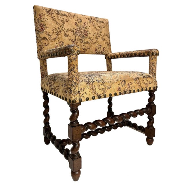 Add a traditional English touch to your decor with this remarkable barley twist walnut armchair with center stretcher from...