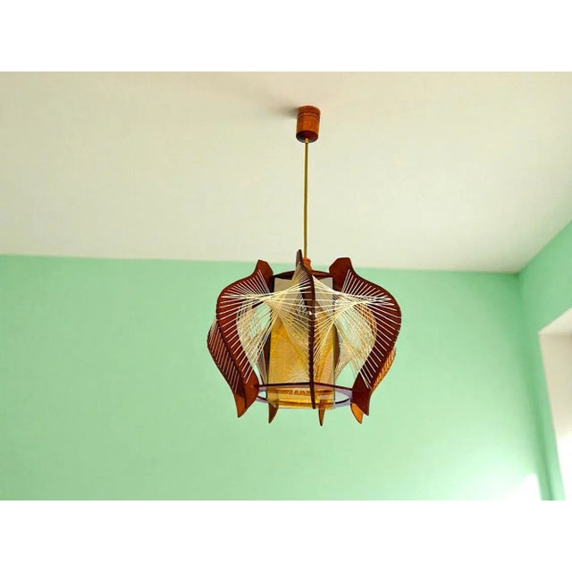 This model of wooden hanging lamp is different from all others we have had in our shop. First, while all other ones came...