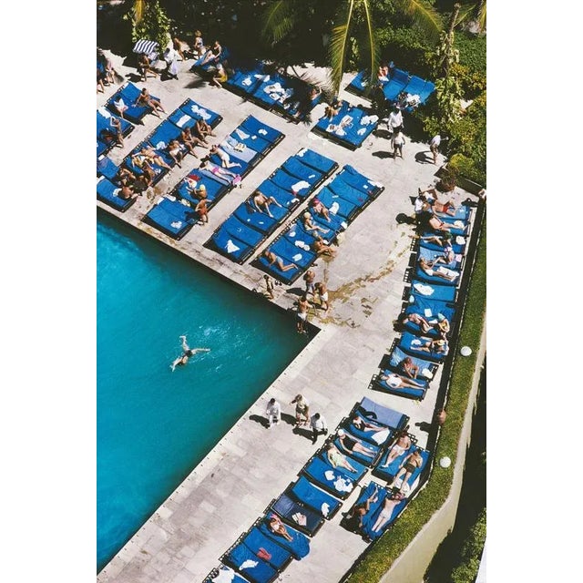 Acapulco Holiday 1966 Deckchairs lined up beside a swimming pool in Acapulco, February 1966. (Photo by Slim Aarons) Slim...