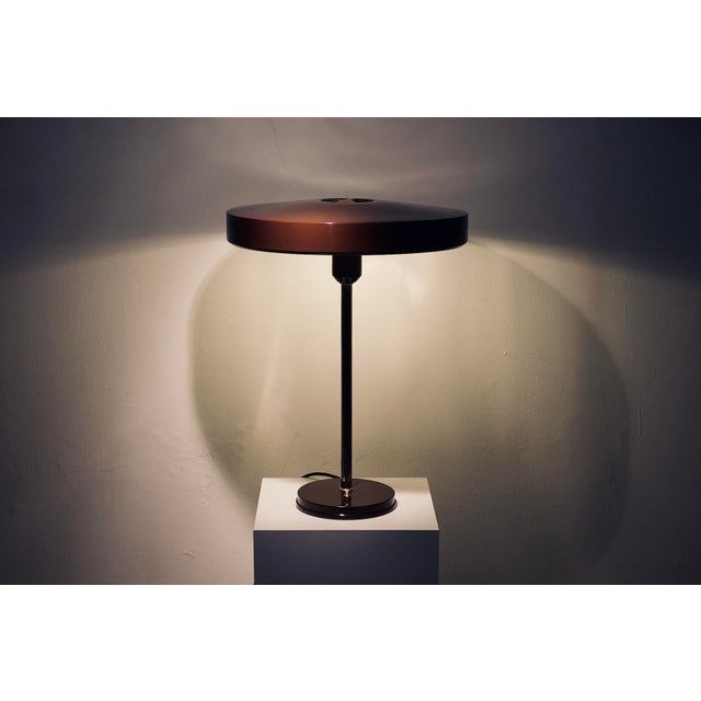 Timor 69 lamp by Louis Christiaan Kalff for Philips, in its brown and brass version. Beautiful presence, balanced...