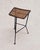 A mid-century bar or counter stool attributed to Dennis Lennon, dating to circa 1950s. The hand-woven rattan cane seat is...