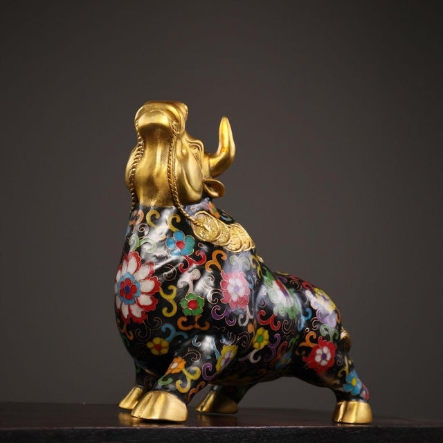 This is a substantial antique cloisonné enamel sculpture of an ox or bull, a traditional Asian symbol representing...