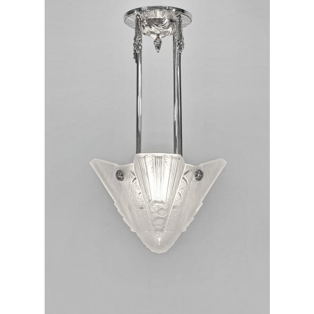 H. Petitot & Muller freres A French 1930 art deco chandelier by Petitot with a large and deep bowl by the glass factory of...
