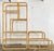 Vintage mid-century modern rattan wrapped etagere / shelving unit. Taller unit features six glass shelves of varying...