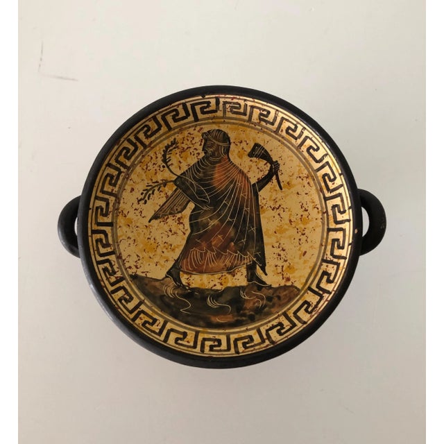 Vintage hand painted footed krater mini decorative bowl with handles. Depicting Greek god and Greek key pattern all...