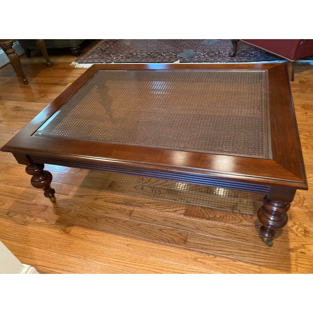 Bring the timeless elegance of the West Indies into your living space with this authentic Ethan Allen British Classics...