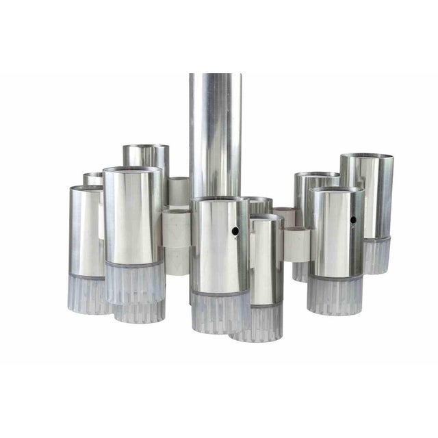 "Modernist" Chandelier attr. to Gaetano Sciolari. Metal, glass and plastic. Dimensions of body: 43x50x50 cm. Very good...