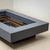 An elegant coffee table designed by Alain Delon (French, 1935–2024) for the renowned Parisian furniture house Maison...
